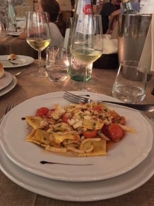 Seabass ravioli in light tomato broth cherry tomatoes and slivered almonds Ballaro Restaurant Palermo Sicily