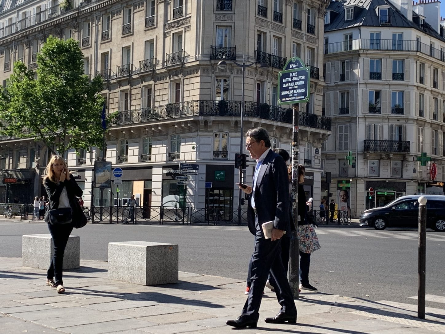 People watching from Cafe Deux Magots, Paris, France. Photo by ConsumerMojo.com