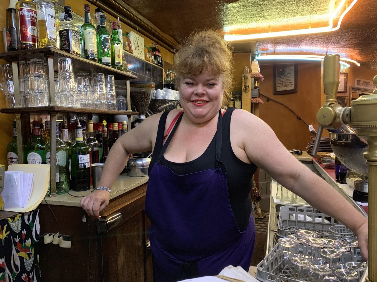 Valery at Chez Paul behind the bar. Paris, France. Photo by ConsumerMojo.com