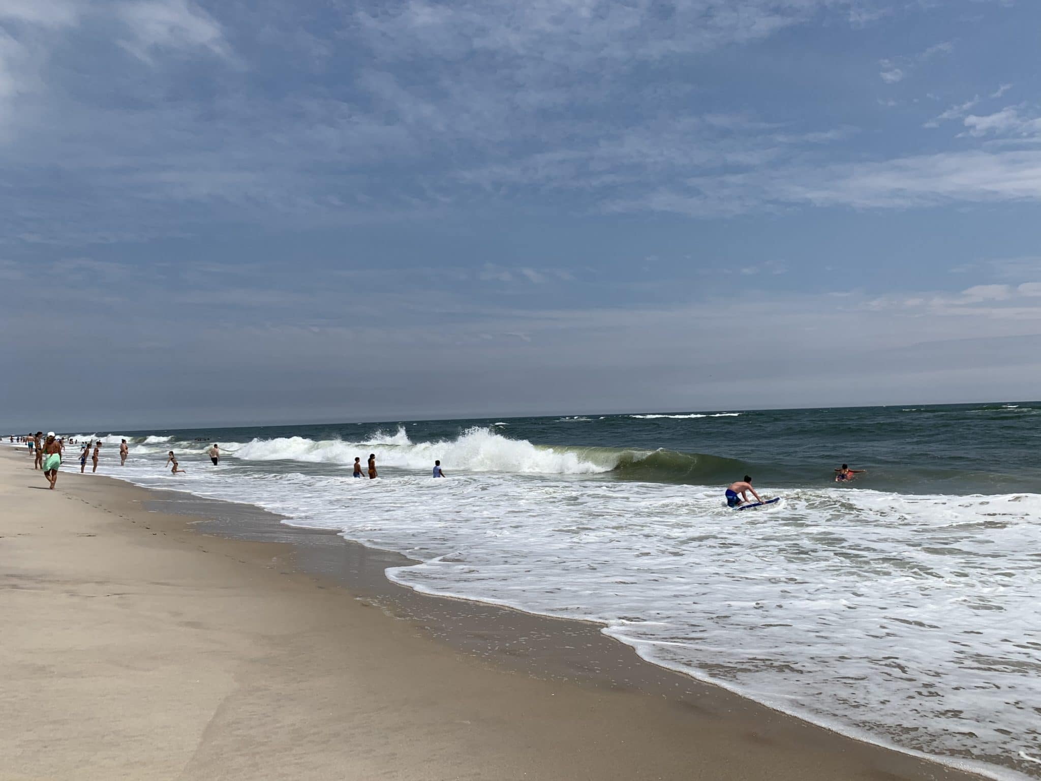 People enjoy the water at Robert Moses State Park, Babylon, Long Island. Photo by ConsumerMojo.com