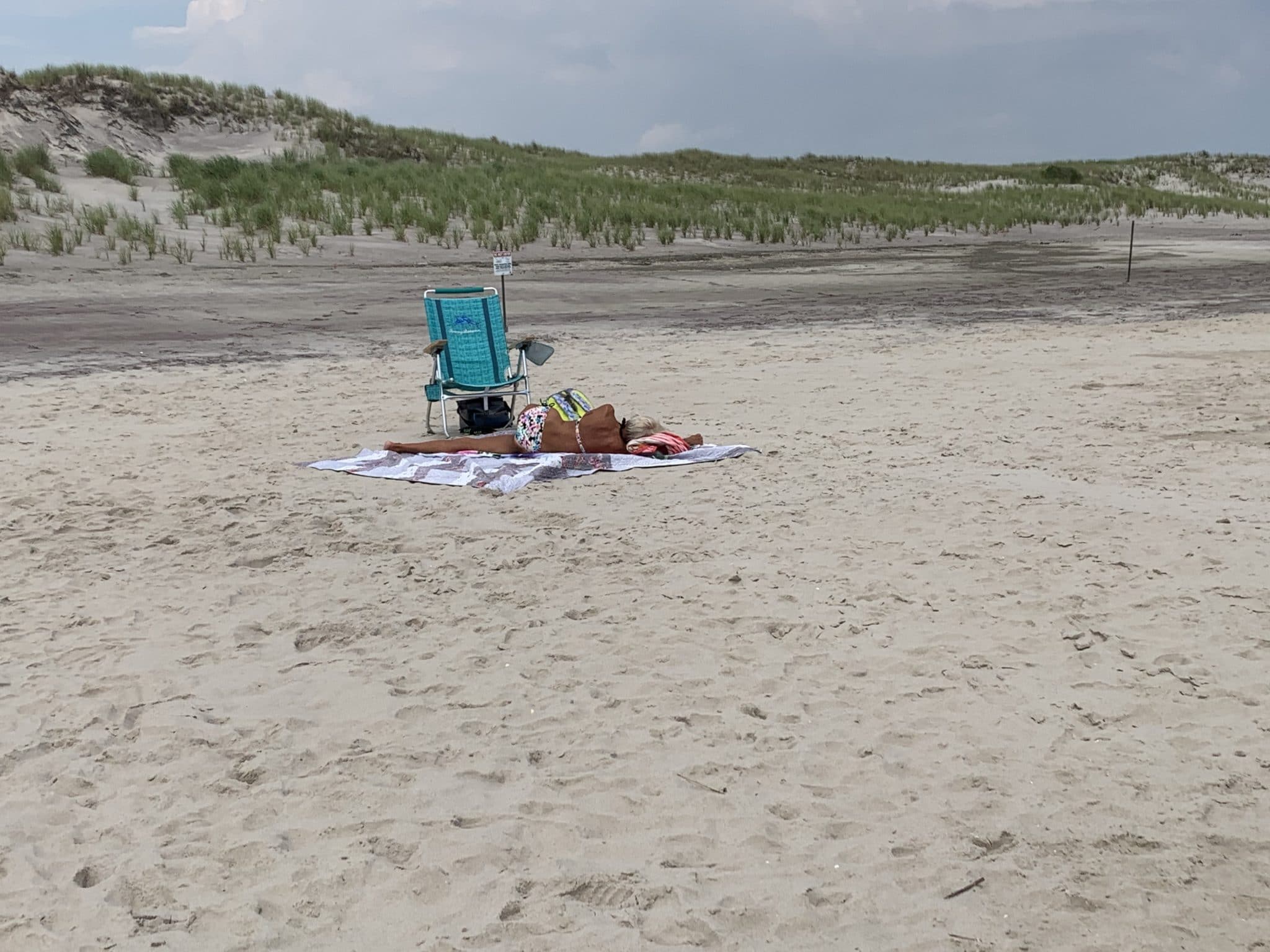 Socially Distanced Sunbather, Robert Moses State Park, Babylon, Long Island. Photo by ConsumerMojo.com