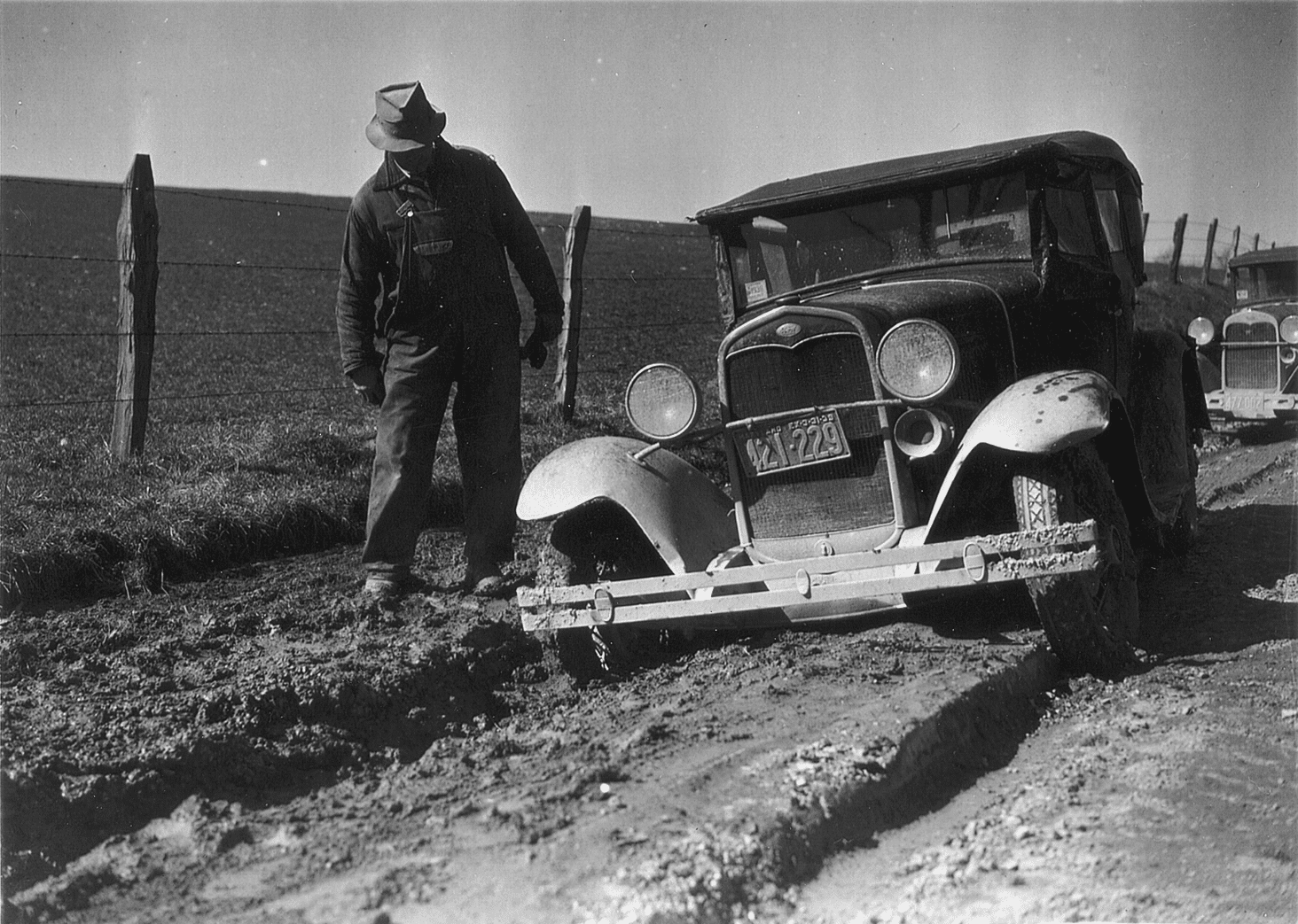 Car in a rut. Courtesy of the National Archive