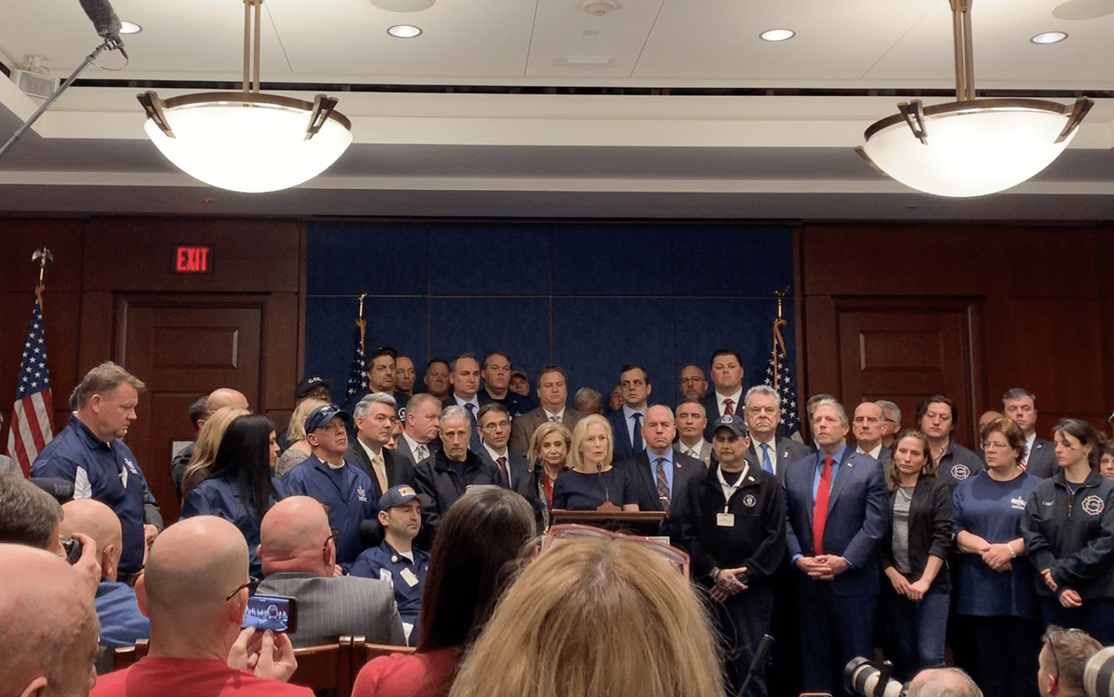 Senator Kirsten Gillibrand, Congresswoman Carolyn Maloney, Jon Stewart and 9:11 first responders. Photo by ConsumerMojo.com