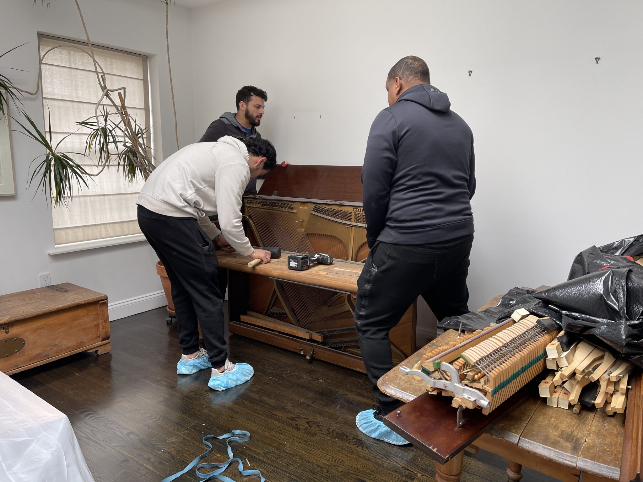 Magic Piano Movers Take Apart Mom's Piano