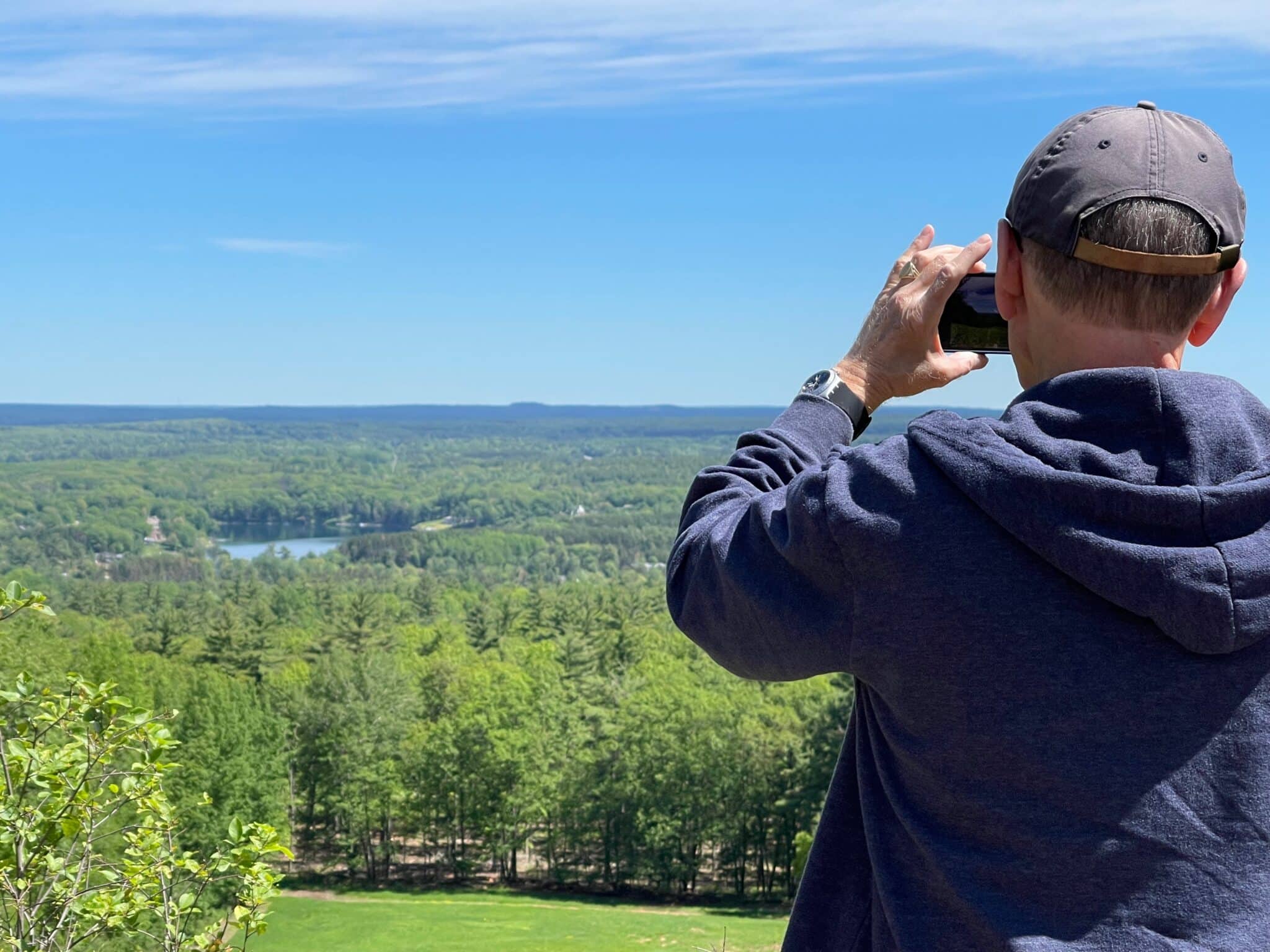 View of Iron Mountain from Pine Mountain. Nick Taylor taking a photo