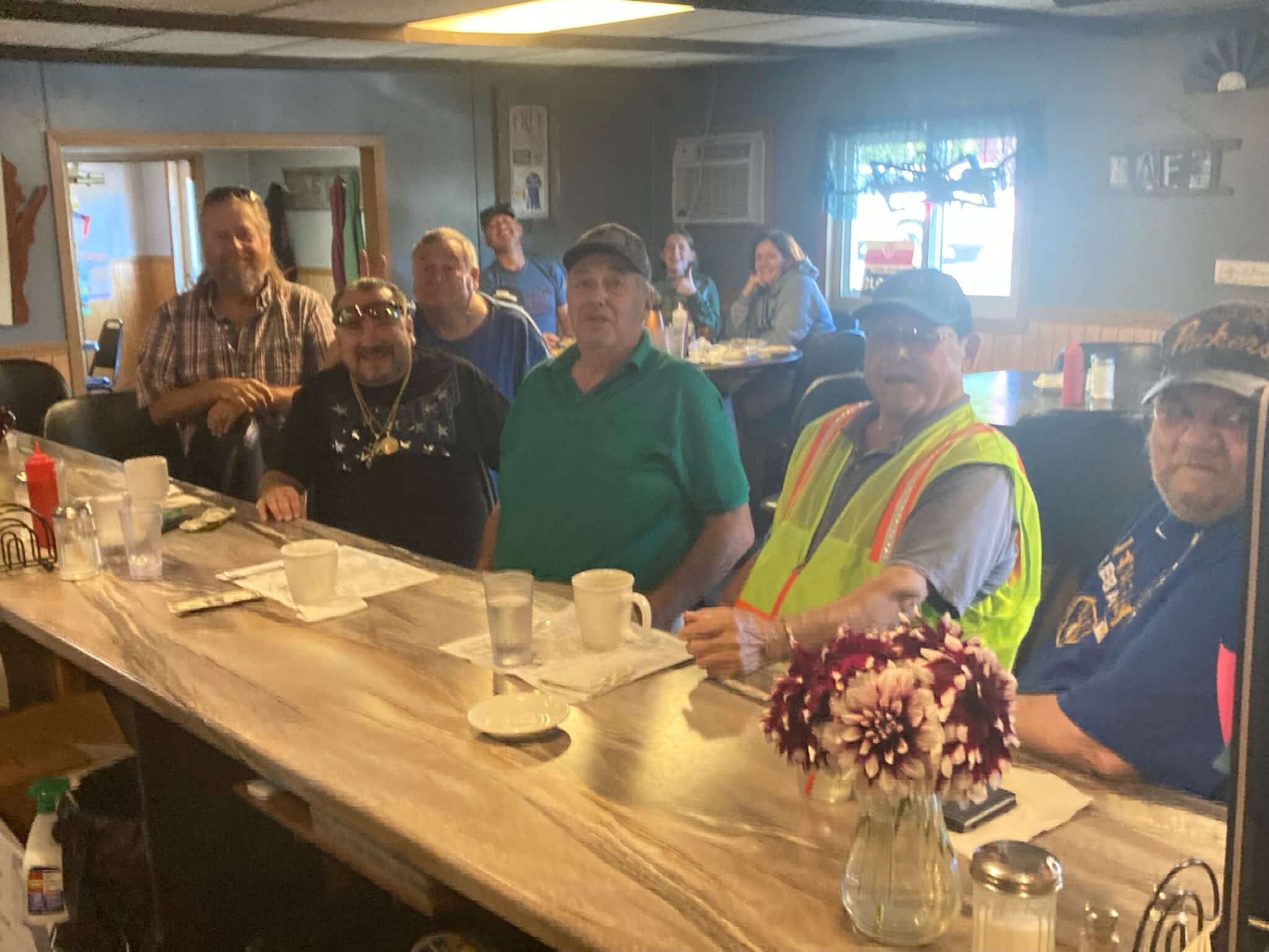 Regulars at the counter of the Kountry Kafe in Fifield, Wisconsin