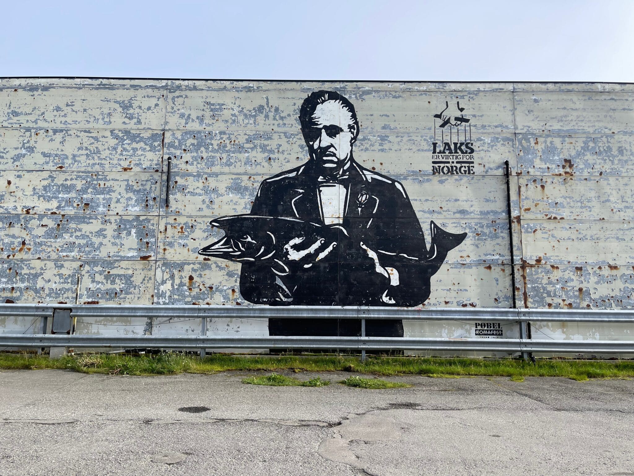 Poster with Marlon Brando from The Godfather holding a fish