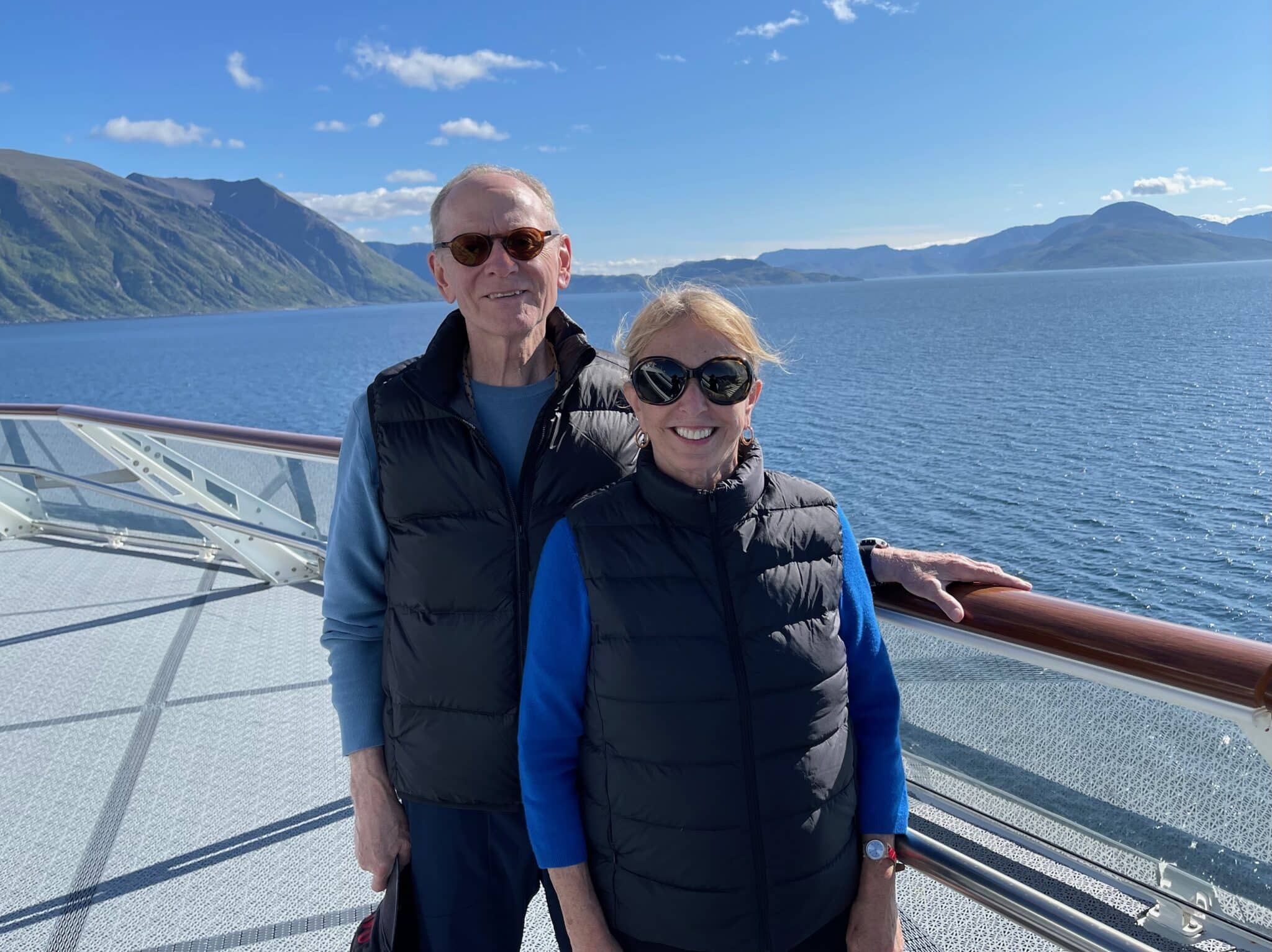 Barbara Nevins Taylor and Nick Taylor in front of Langstrand Island in the Norwegian Fjords