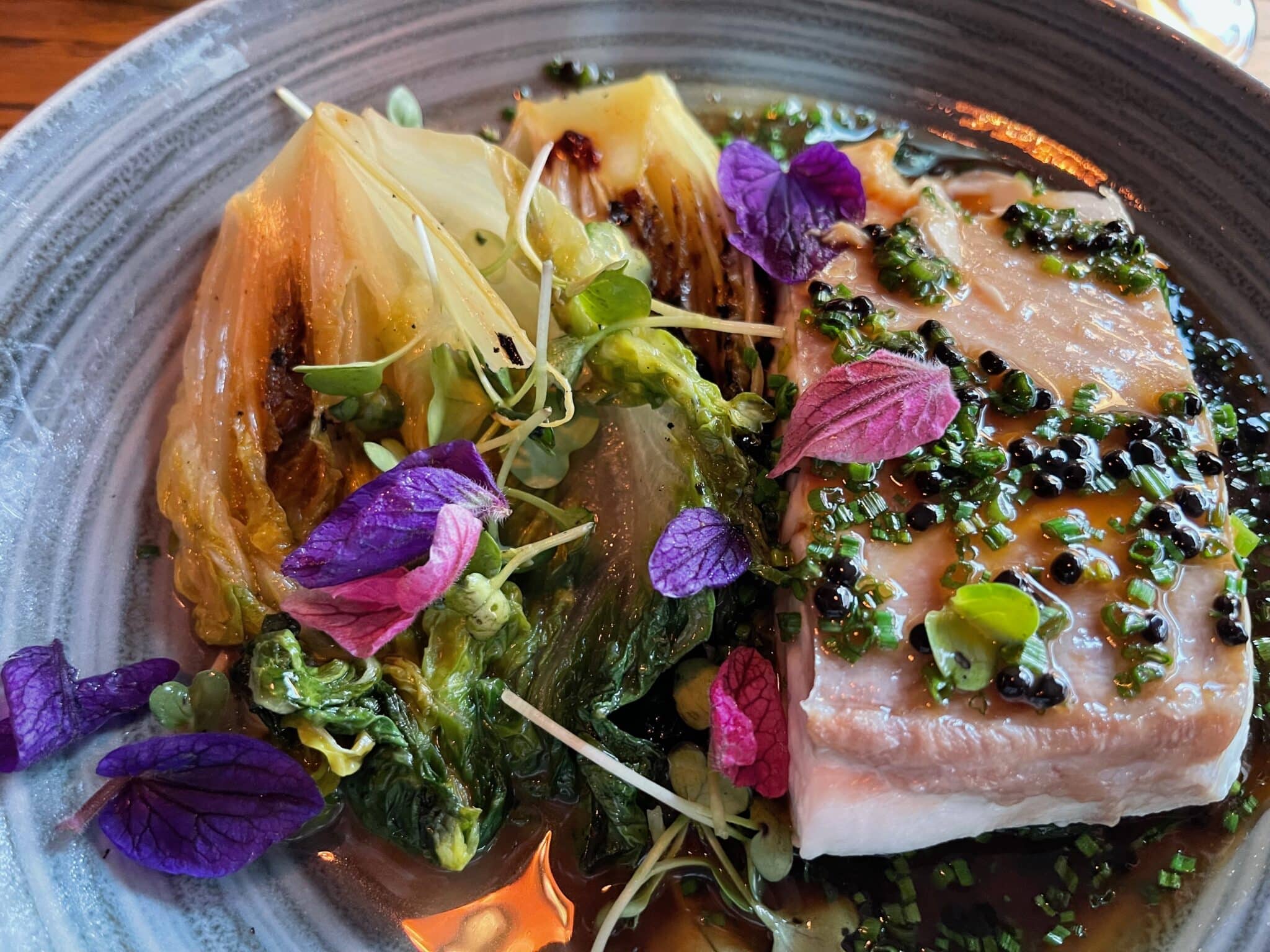Artic char and capers and endive and flowers