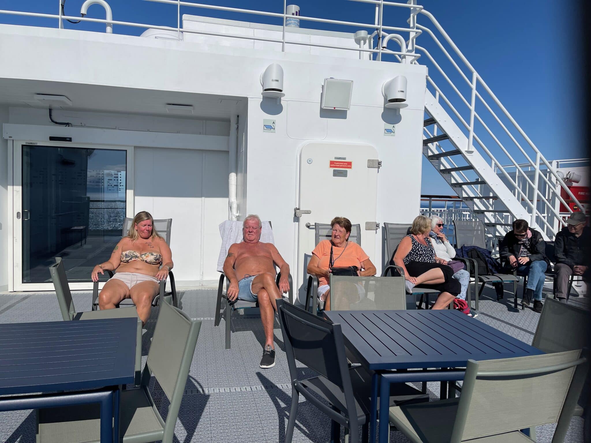 Sunbathing aboard the Castor Snofjord