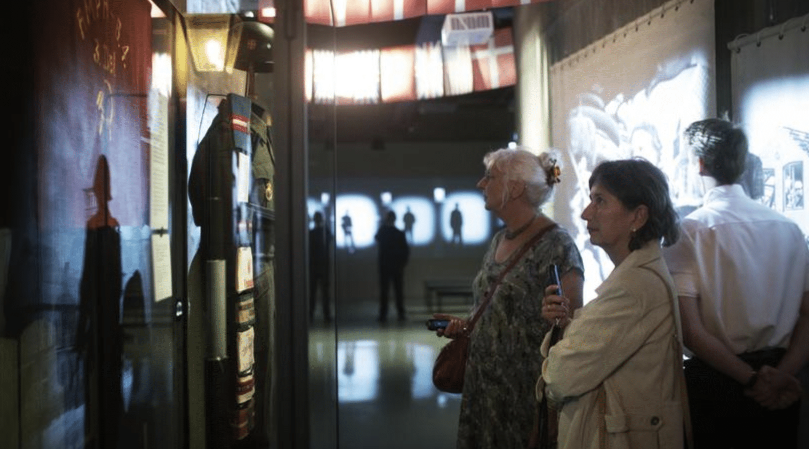 People looking at the exhibit in the Museum of Danish Resistance