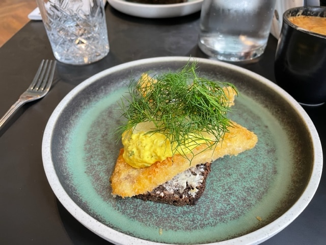 Potato salad and fish open sandwich 