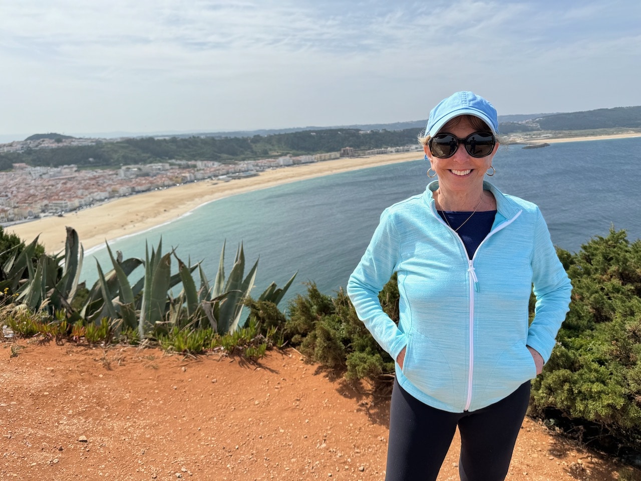 Barbara Nevins Taylor on the cliff above Nazarê