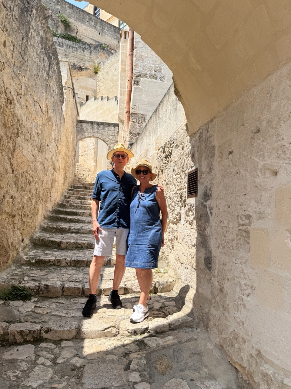 Nick Taylor and Barbara Nevins Taylor on the steps in Matera. Photo by ConsumerMojo.com