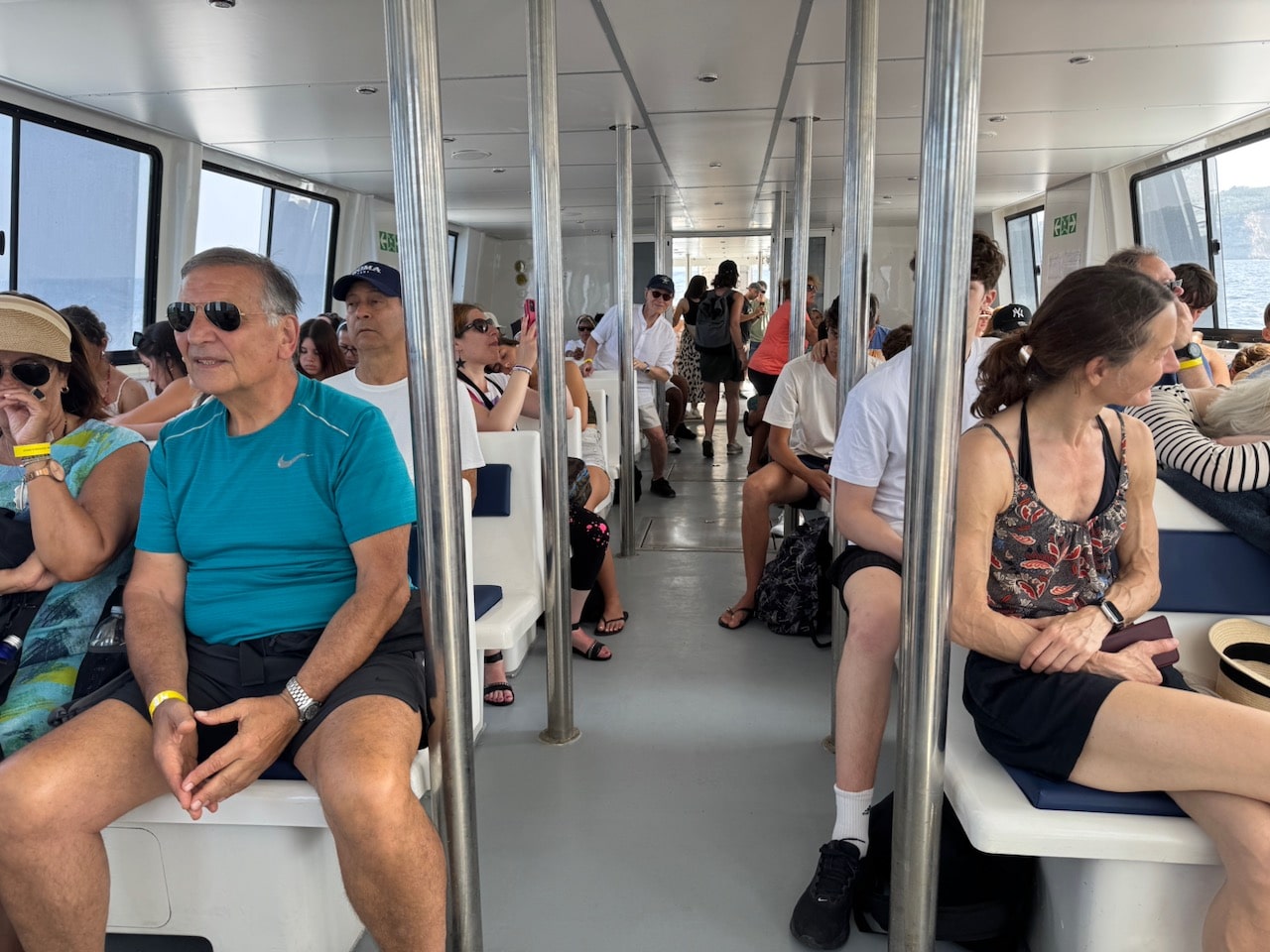 Nick Taylor peaking out into the aisle of the boat.