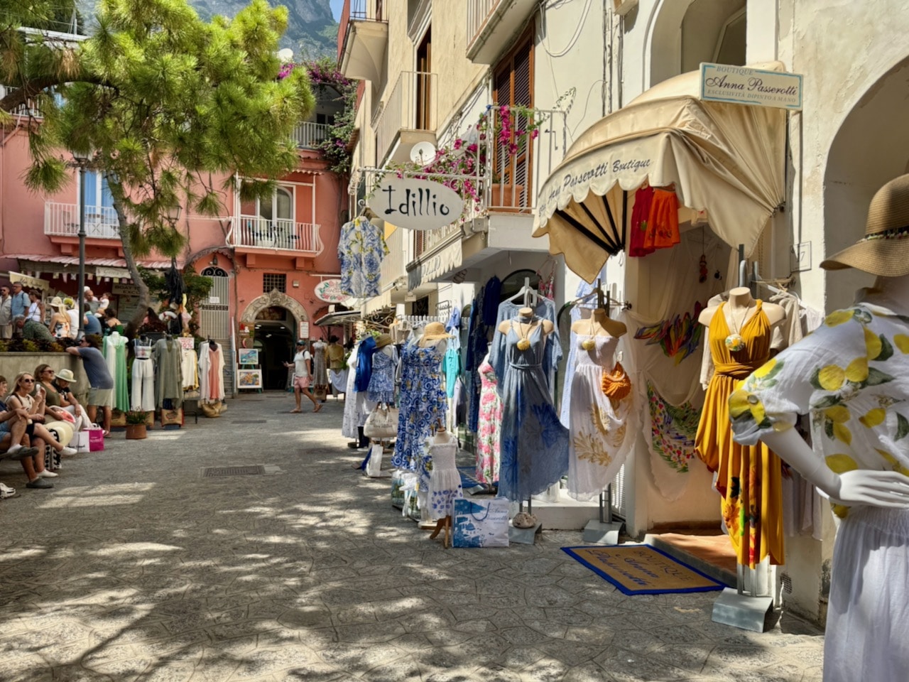 Positano town with dress stores. Photo by ConsumerMojo.com