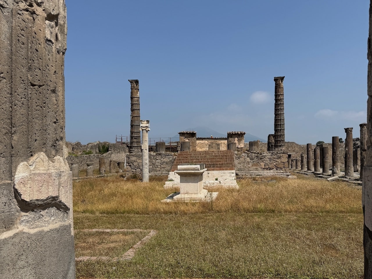 Sanctuary of Apollo with Vesuvius in the background. Photo by ConsumerMojo.com
