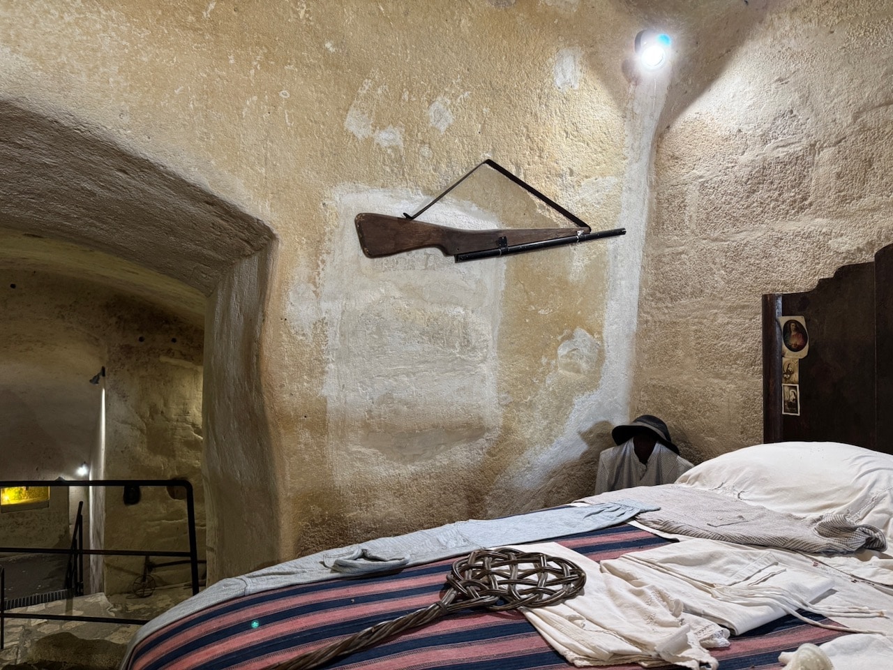Shot gun in the Matera cave house. Photo by ConsumerMojo.com