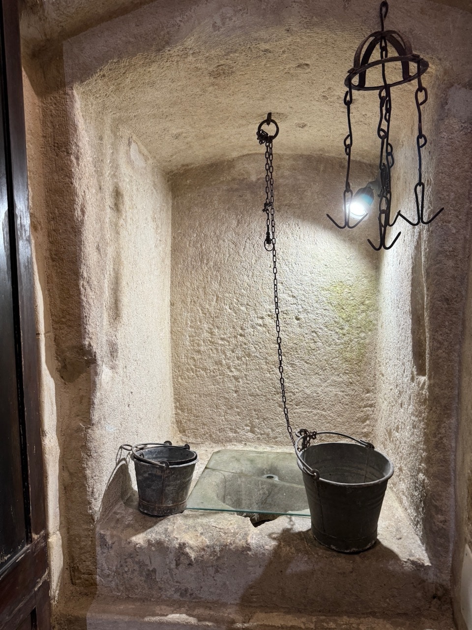Cave house toilet contraption in Matera.Photo by ConsumerMojo.com