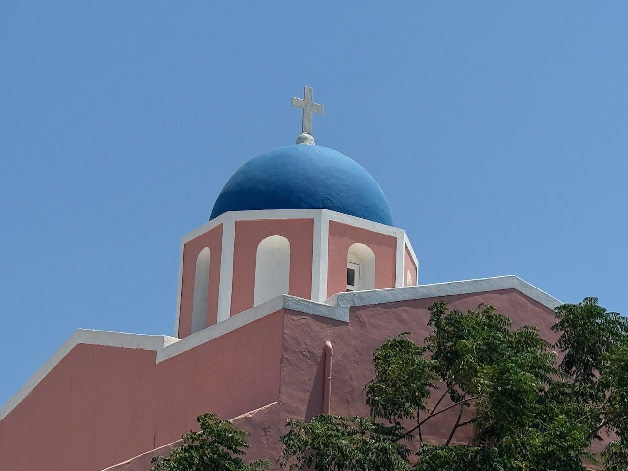 Closeup of Church of the resurrection in Oia on Santorini, Greece. Photo by ConsumerMojo.com