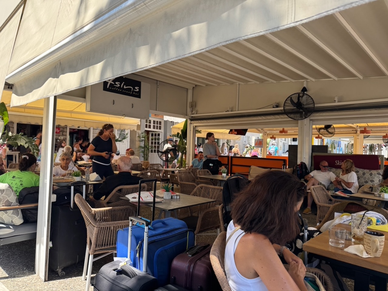 Cafe near the harbor in Skiathos, Greece. Photo by ConsumerMojo.com