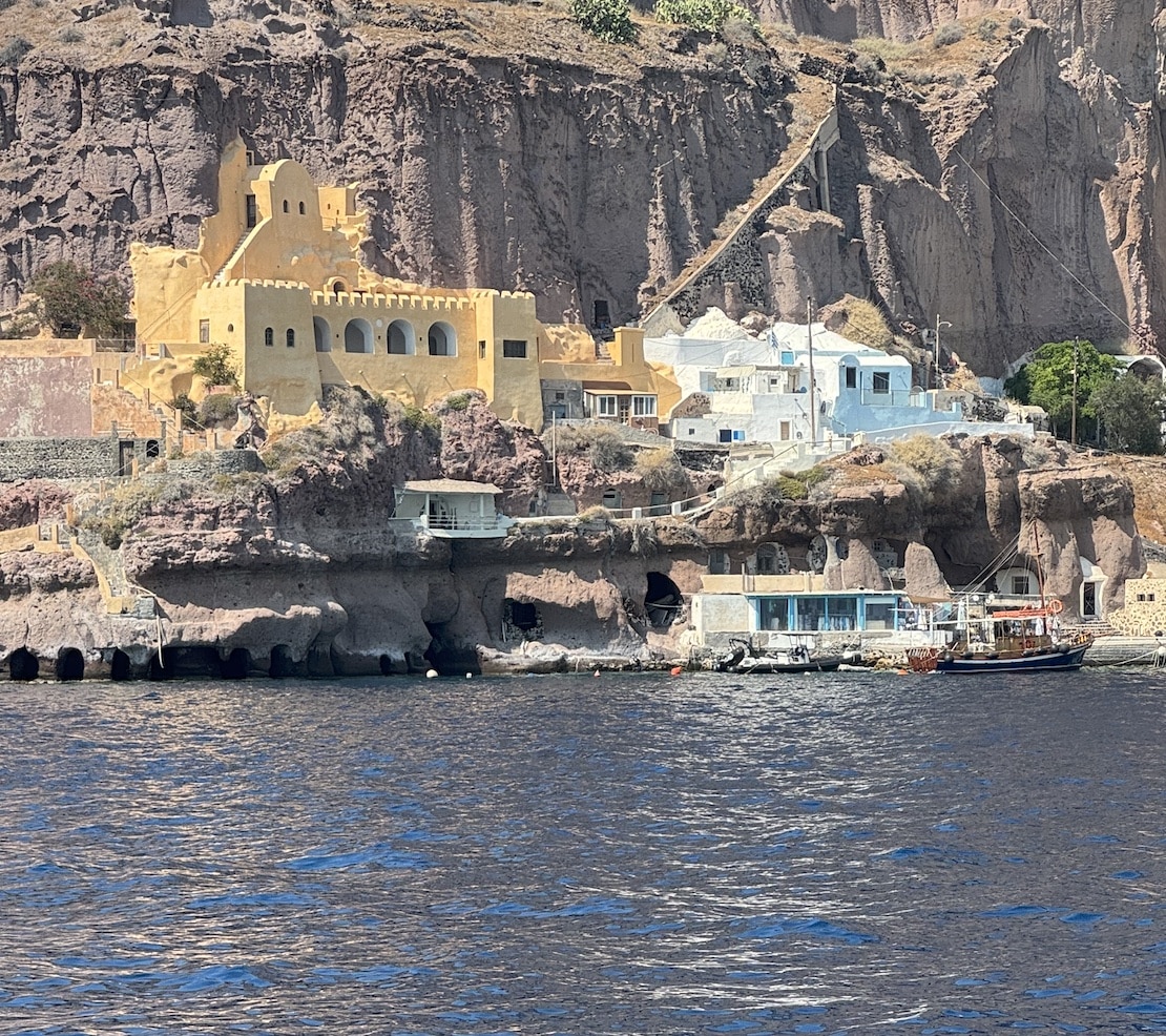 Houses built in the cliffside, Fira Santorini, Greece.