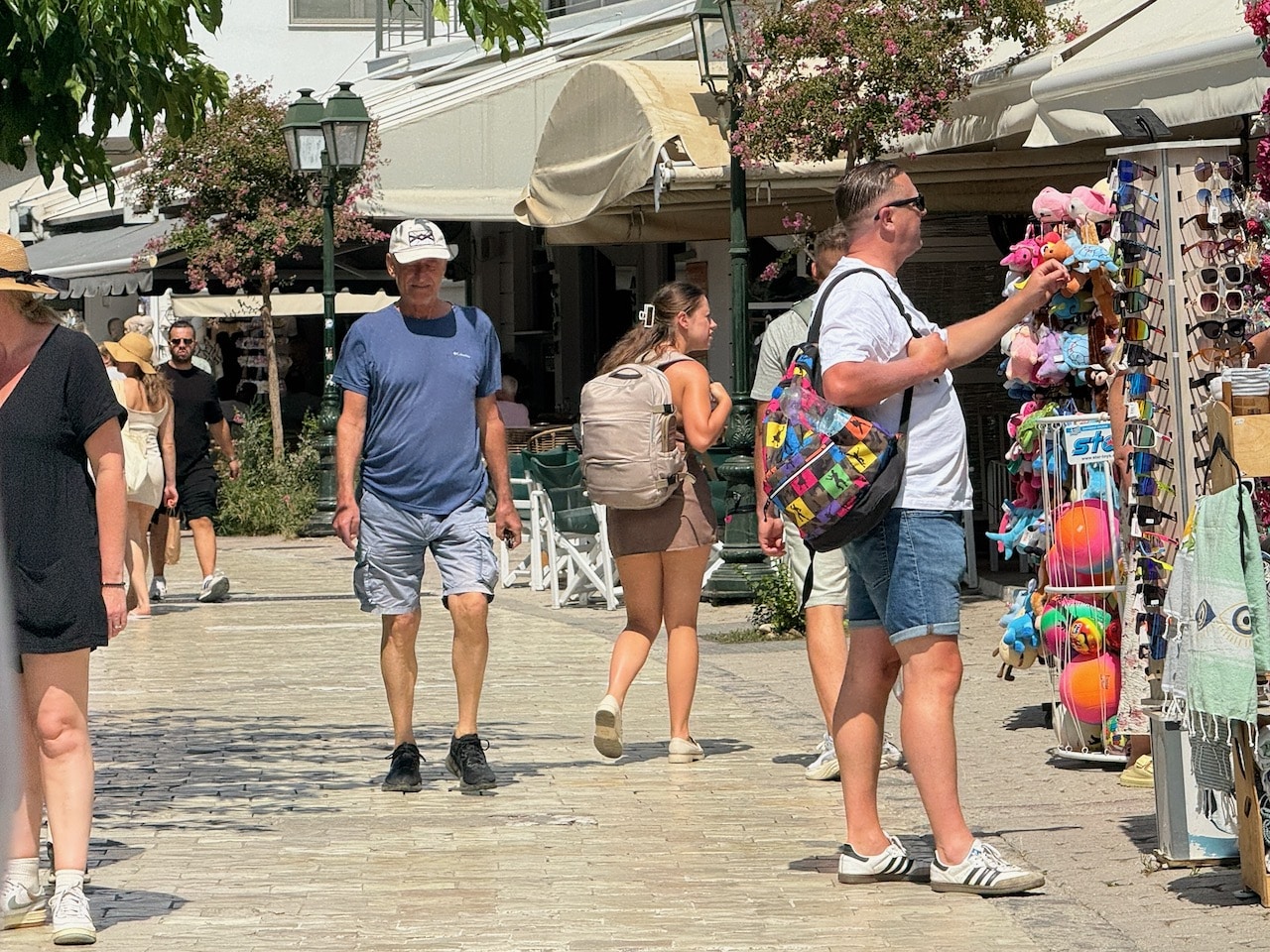 People shopping for touristy stuff in Skiathos. Photo by ConsumerMojo.com