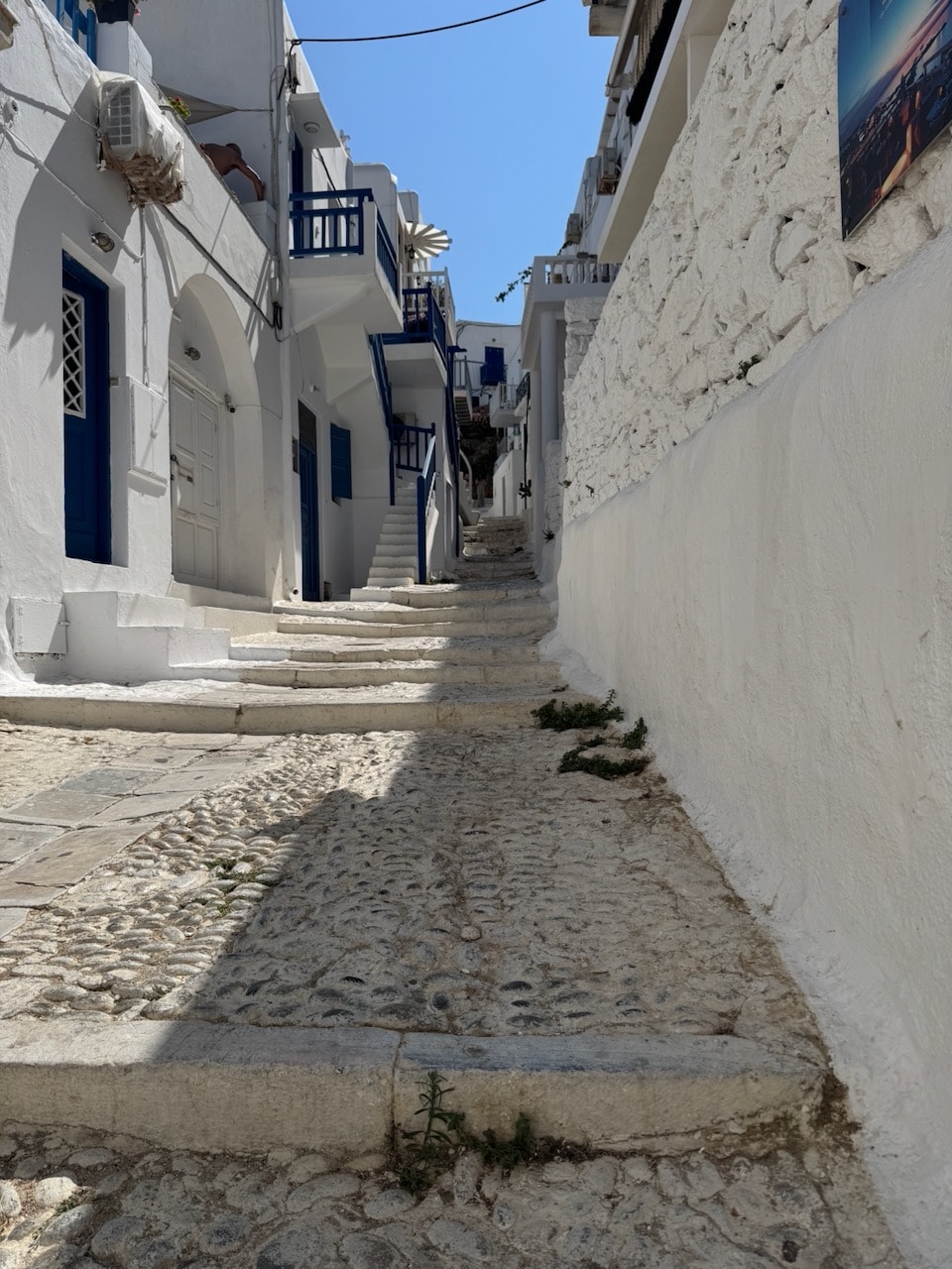 Narrow alleys with houses on Mykonos. Photo by ConsumerMojo.com