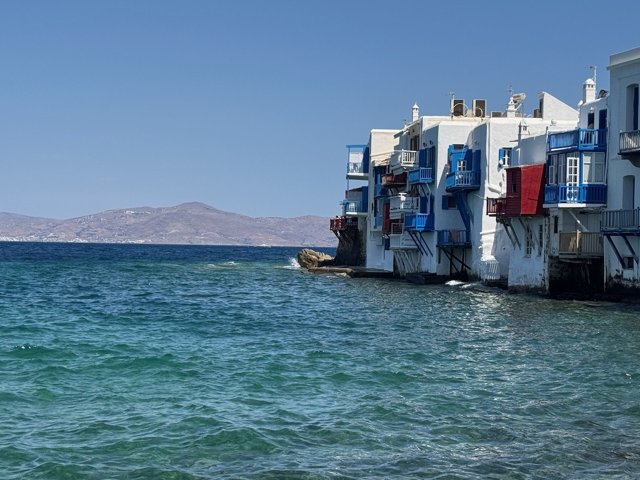 Precarious houses in Little Venice on Mykonos. Photo by ConsumerMojo.com